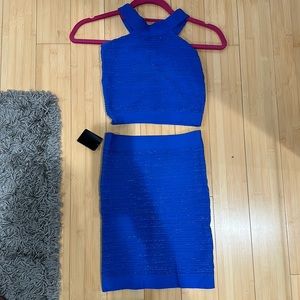 Two piece crop top and skirt. NWT. Stretchy. Bebe size small.